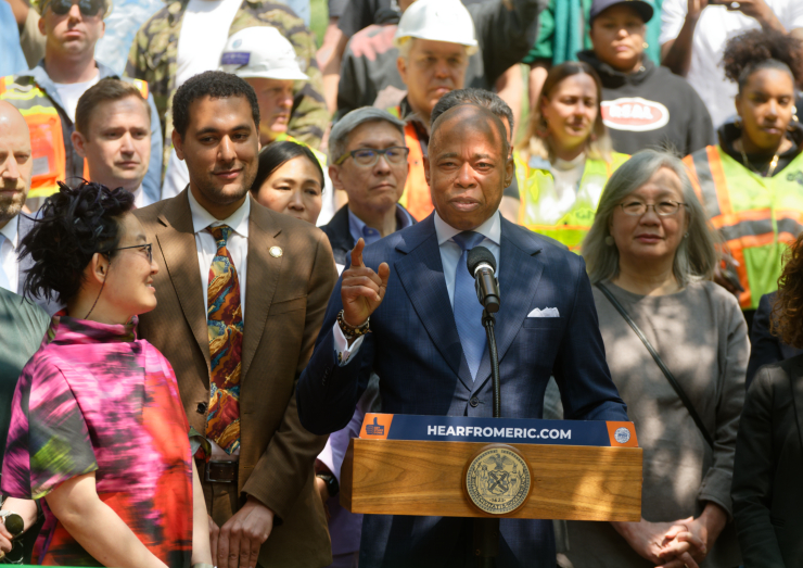 At the ceremonial opening of The Arches, a new public park, Mayor Eric Adams recalls Rosa Chang, left, and her fellow advocates, selling him on a plan to restore space beneath the Brooklyn Bridge for public use. “We stand in the shadow of the iconic Brooklyn Bridge,” Chang told the gathering. “It is a legacy and a challenge to dream big, to dream strong, and to never give up. Photo: Carl Glassman/Tribeca Trib